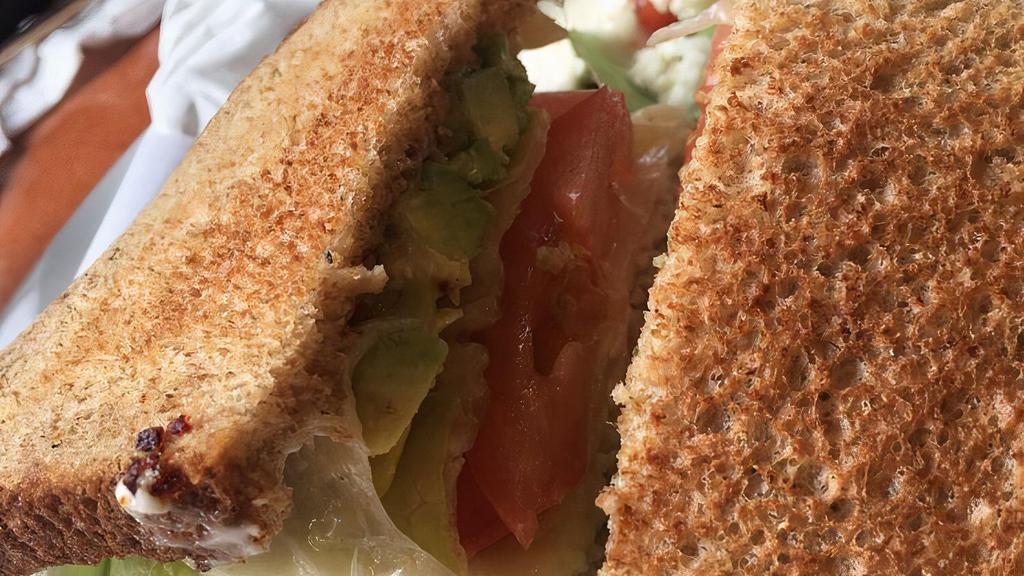 Panini Super Club Sandwich · Turkey, ham, bacon, tomato, lettuce, mayo, and mustard.