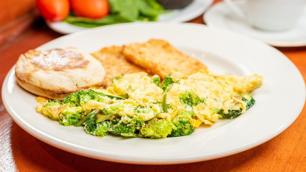 Veggie Breakfast · Two scrambled eggs, mixed with veggies. Served with English muffin and choice of fruit or hash browns.
