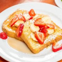 French Toast · With fruit and maple syrup.