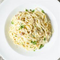 Spaghetti alla Carbonara · Caramelized onions, pancetta, local duck egg, black pepper.

Dish is vegetarian or can be ma...