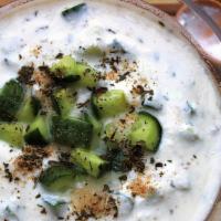 Mast O Khiar · Yogurt with cucumber mixed with dry dill/mint and a hint of garlic.