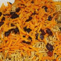 Qabuli Palau · Seasoned basmati rice tossed in with juicy chicken leg quarter, topped with julienned carrot...