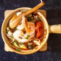 Tom Yum (Bowl) · Hot & sour soup with mushroom, tomato, galangal, kaffir lime leaves,lemongrass, onions & cil...