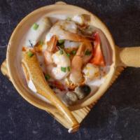 Tom Kha (Bowl) · Coconut milk in hot & sour soup with mushroom, tomato, galangal, kaffir lime leaves, lemongr...