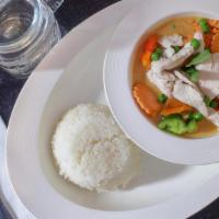Panang Curry · Coconut milk panang curry with peas, carrot, bells & basil.