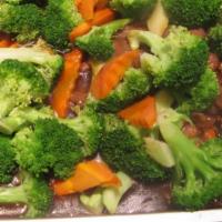 Broccoli Beef · Beef sautéed with broccoli and carrots in oyster sauce