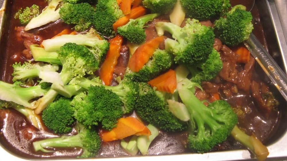 Broccoli Beef · Beef sautéed with broccoli and carrots in oyster sauce