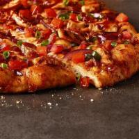 BBQ Chicken Pizza · Backyard BBQ meets handmade pizza grilled white meat chicken, bacon, cheddar, tomatoes, red ...