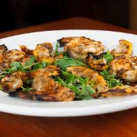 Marinated Prawns · Marinated in garlic, lemon, seasoning and olive oil. served with a little bit of arugula and...