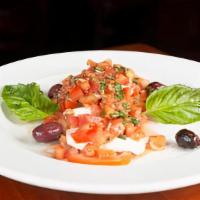 Mozzarella Fresca Salad · Caprice salad with fresh sliced roma tomatoes, fresh mozzarella, basil and olive oil