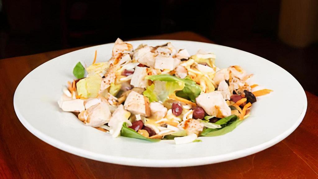 The Works Salad · Romaine, Spring Mix, Kidney Beans, Garbanzo Beans, Carrots, Onions, Croutons, Mozzarella & Chicken. Choice of dressing