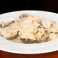 Risotto Pescatore · Risotto with scallops, prawns and clams with a white wine, butter, garlic sauce. Red with a ...