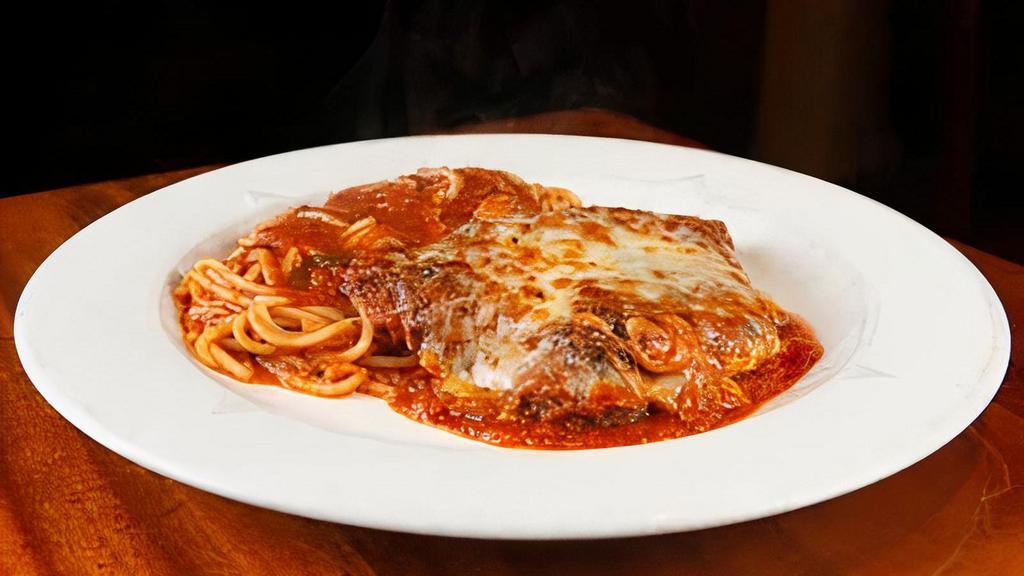 Eggplant Alla Parmigiana · Eggplant dipped in flour and sautéed. Baked in the oven with Mozzarella and tomato sauce. Comes with choice of one side.