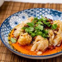 Wonton with House Chili Sauce  · Pork and shrimp wonton in house flaming chili oil