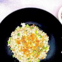 RN7. House Fried Rice · Fried rice with choice of meat, carrots, egg, peas, and onion.