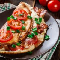 Canadian Bacon · Canadian bacon, mushrooms,
avocado and cheddar cheese