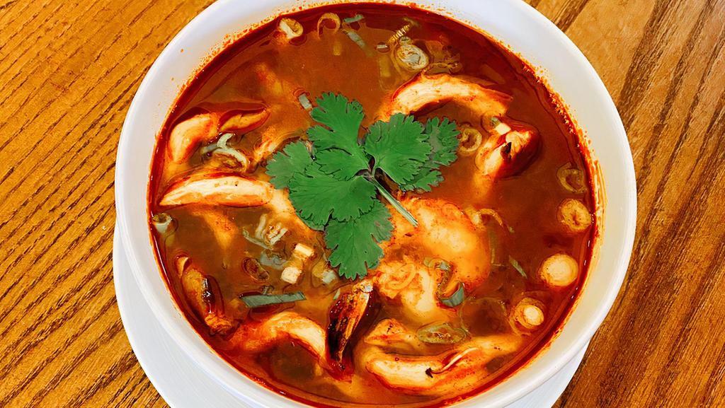 Tom Yum · Vegetarian option. Medium spicy. Lemongrass, kaffir lime leaves, cilantro, oyster mushrooms, red onions, green onions in spicy, and sour broth.