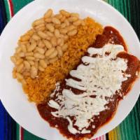 Enchiladas Plate · Three enchiladas with your choice meat, sauce (green or red) topped with sour cream and ques...
