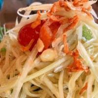 Thai Papaya Salad · Papaya salad + dried shrimp + Thai chili + tomato + peanut + tamarind lime dressing