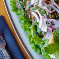 Kobe Beef Steak Salad · “Snake River Farms” Kobe-style beef grilled to perfection + green lettuce + tomatoes. W/ tam...