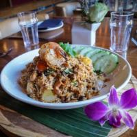 Thai Fried Rice · Classic fried rice + egg + tomatoes + onion and choice of tofu or chicken