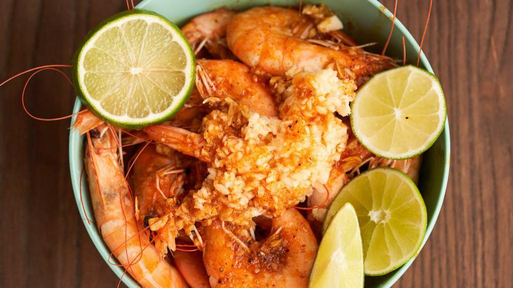 Shrimps · 16 large size boiled shrimps in a savory sauce.