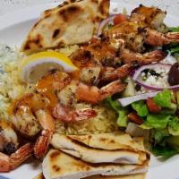 Wild Shrimp Souvlaki Plate · wild shrimp grilled to perfection, marinated with garlic and rosemary.