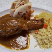 Lamb Shank Plate · fresh made from our family recipe is cook over 5 hours the meat so tender and flavored.