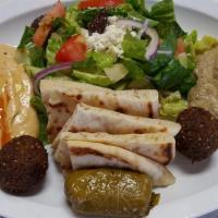 Veggie Combo Plate · Falafel with Greek salad, hummus, dolmathes, baba ganoush, and pita.