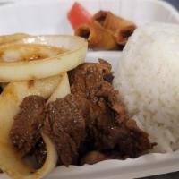 Bistek over Rice · Beef steak in soy marinade served with steamed rice and spring rolls.