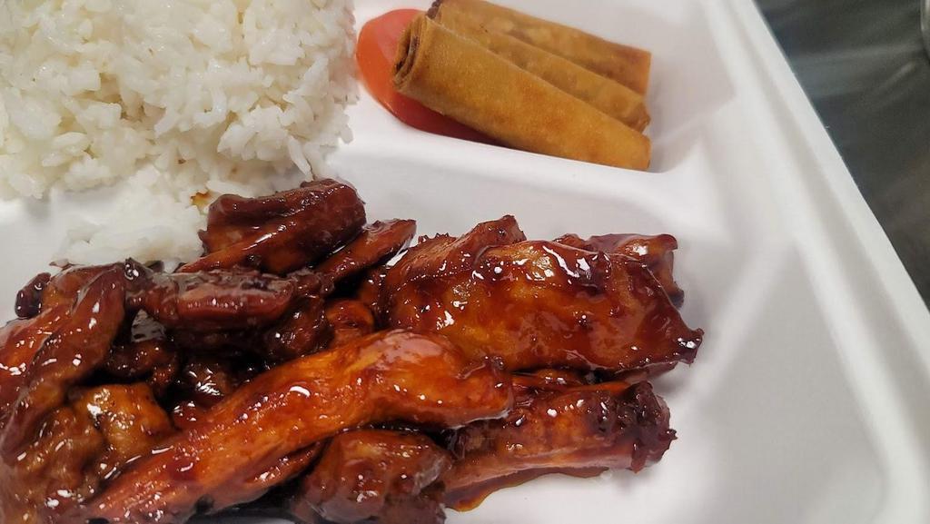 BBQ Chicken over Rice · House flavored chicken meat grilled to perfect juicy chunk served with rice and spring rolls.