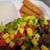 Crispy Binagoongan over Rice · Pork cutlets in shrimp-paste mixed with eggplant and mango salsa, served with steamed rice a...