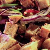 Tokwa't Baboy · Pork cutlets and fried tofu mixed with bell peppers and onions in a soy-vinegar sauce. Serve...