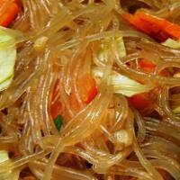 Pancit Bihon · Traditional thin rice noodles sauced with mixed cabbage, carrots, bell peppers, pork and shr...