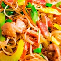 Pancit Combination · Canton (thick) and Bihon (thin) noodles cooked with traditional veggie mix and topped with p...