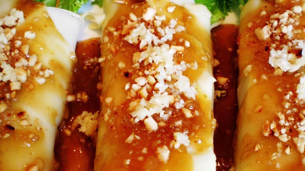 Lumpiang Sariwa · Diced carrots, cabbage, jicama and bean sprouts egg-wrapped and rolled then served with sugared sauce, garlic and peanuts. Serves 1-2 people.