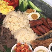 Breakfast Delight · Combination of longganisa, tocino, tapa, bangus and porkchop, served with garlic rice, salte...