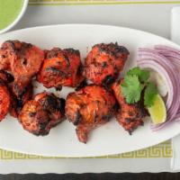 Jali Chicken Tikka · Chicken breast grilled with special sauce.
