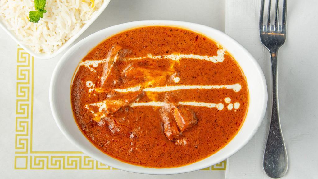 Butter Chicken Masala · Boneless chicken cooked in a creamy mildly spiced curry sauce.