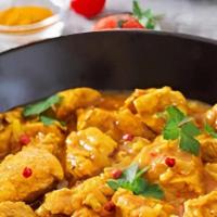 Chicken Curry  · Medium spicy, gluten free.
