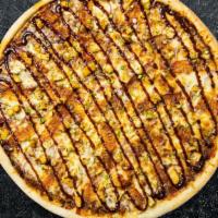 BBQ Chicken Pizza · BBQ sauce, chicken, red onion and cilantro baked on a hand-tossed dough.