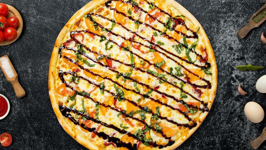 Margherita Pizza · Fresh basil, fresh tomato and mozzarella cheese baked on a hand-tossed dough.