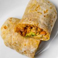 Super Burrito · Everything as the regular plus cheese, sour cream, and guacamole. All rolled in a flour tort...
