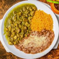 Chile Verde · Tender pieces of pork simmered in a mild green sauce. Served with rice, refried beans topped...