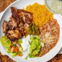 Carnitas · Traditional Mexican style deep-fried pork. Served with guacamole and sour cream. Served with...