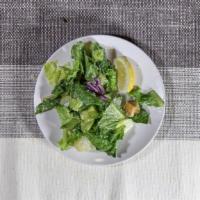 Caesar Salad · Crisp romaine hearts and parmesan with creamy anchovy dressing.