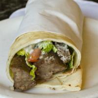 Gyros Sandwich · Served with lettuce, tomato, and onions on fresh baked pita bread with tzatziki.