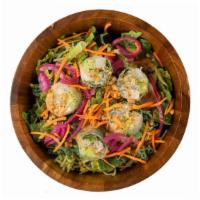 Fresh Spring Roll Salad · Roasted peanut dressing and citrus shrimp, romaine lettuce, carrots and pickled red onions.