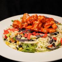 BBQ Chicken Salad · Black beans, corn, cilantro, tortilla strips, jack, ranch BBQ sauce, tomatoes, green onions.
