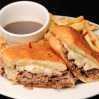 French Dip · Tri-tip, provolone, au jus, side dish.